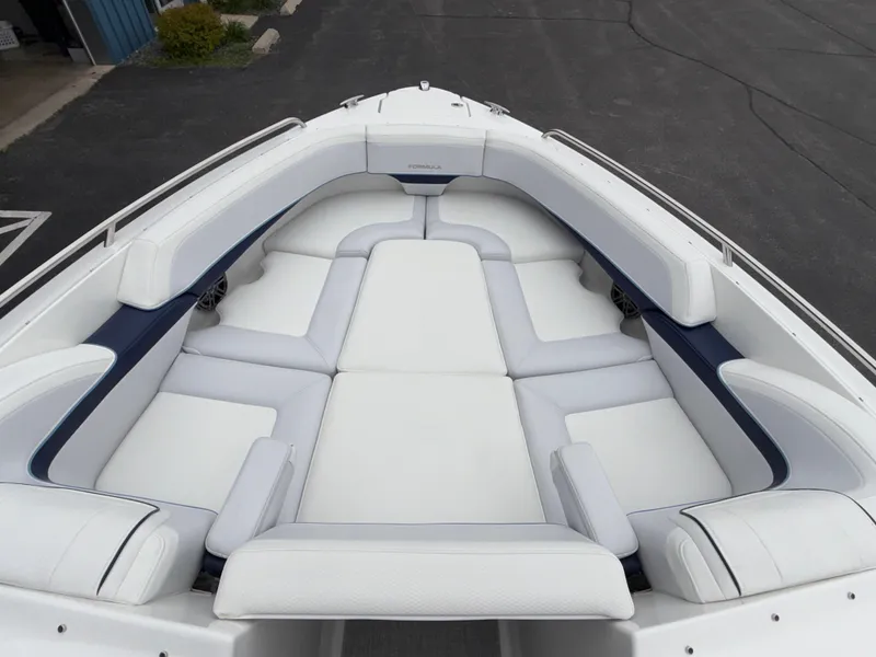 Slide: The Image of 2025 Formula 270 Bowrider boat with spacious white seating area. - 37