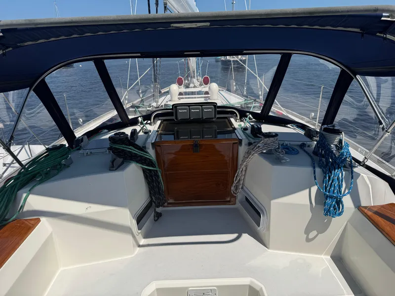 Slide: The Image of Cockpit of 1987 Sabre 42 sailboat with ropes and navigation equipment. - 4