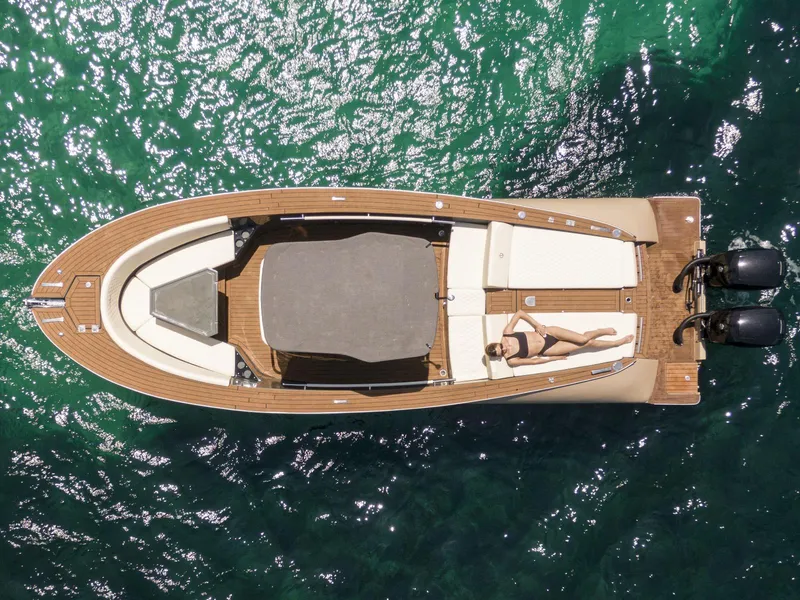 Slide: The Image of Overhead view of 2025 AlCustom Levanzo 25 yacht on clear water. - 1