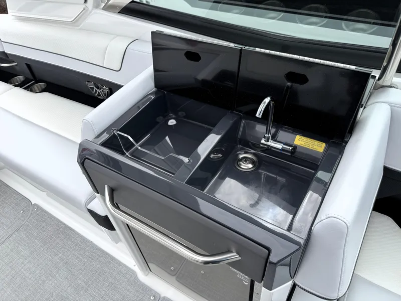 Slide: The Image of 2025 Formula 330 Crossover Bowrider I/O boat sink and countertop detail. - 27
