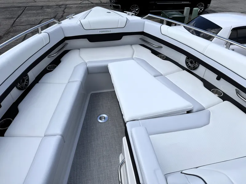 Slide: The Image of 2025 Formula 330 Crossover Bowrider I/O, spacious seating, luxurious interior, modern design. - 33