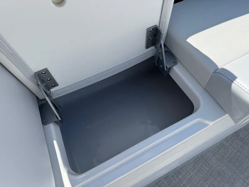 Slide: The Image of Storage compartment in 2025 Formula 330 Crossover Bowrider I/O boat, featuring sleek design and functionality. - 7