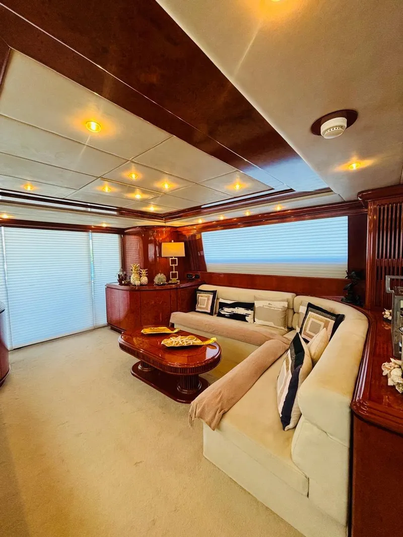 Slide: The Image of Luxurious interior of 2000 Falcon Motoryacht with elegant seating and wooden accents. - 17