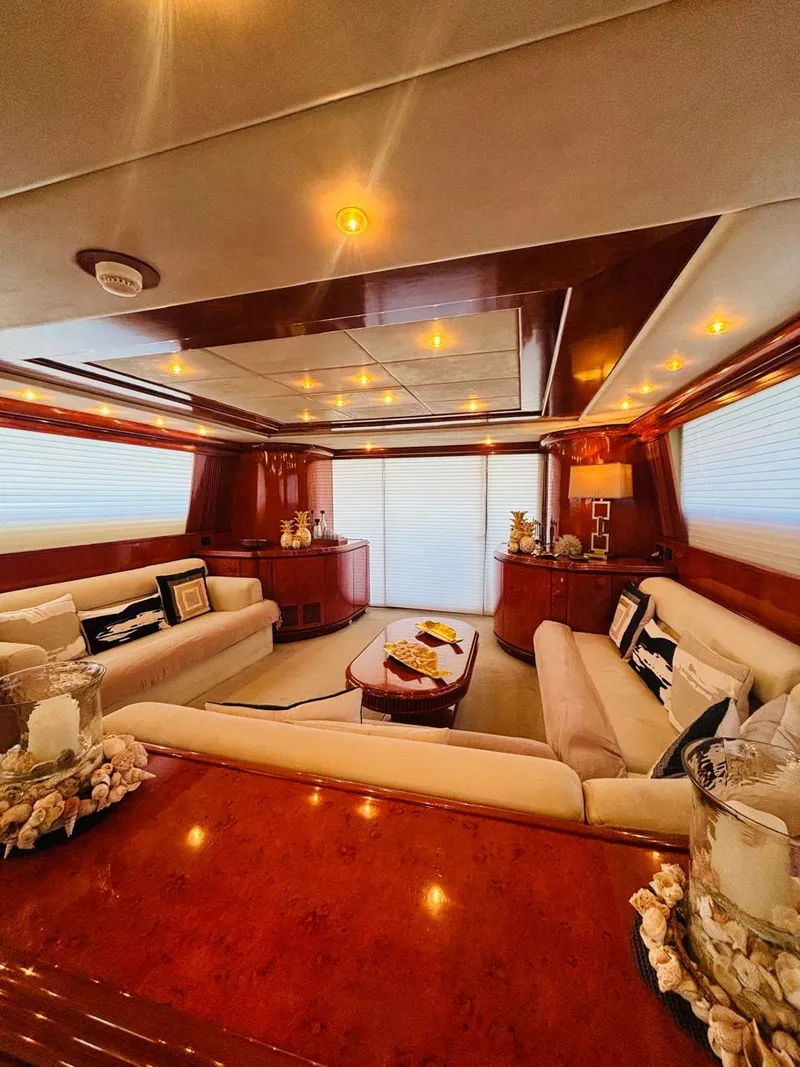 Slide: The Image of Luxurious interior of a 2000 Falcon Motoryacht with elegant seating and warm lighting. - 19
