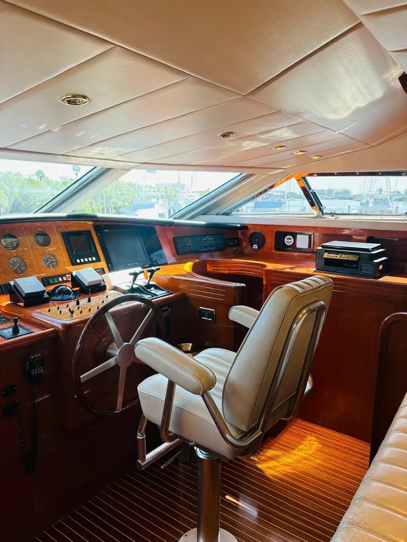 Slide: The Image of Luxurious Falcon Motoryacht 2000 cockpit with leather seating and advanced navigation controls. - 28