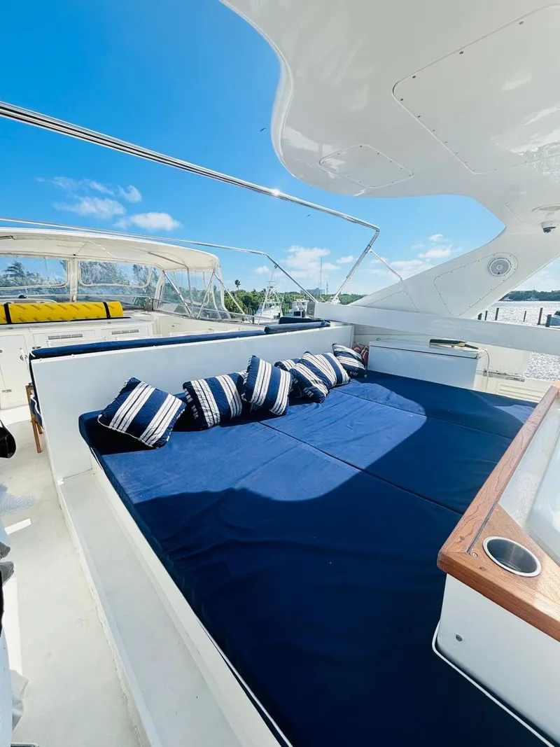 Slide: The Image of Luxurious 2000 Falcon Motoryacht with spacious sun deck and comfortable seating. - 6