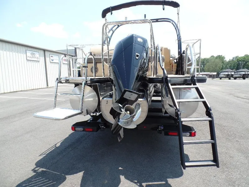 Slide: The Image of 2025 Harris SUNLINER SP 250 pontoon boat, rear view with motor and ladder. - 17