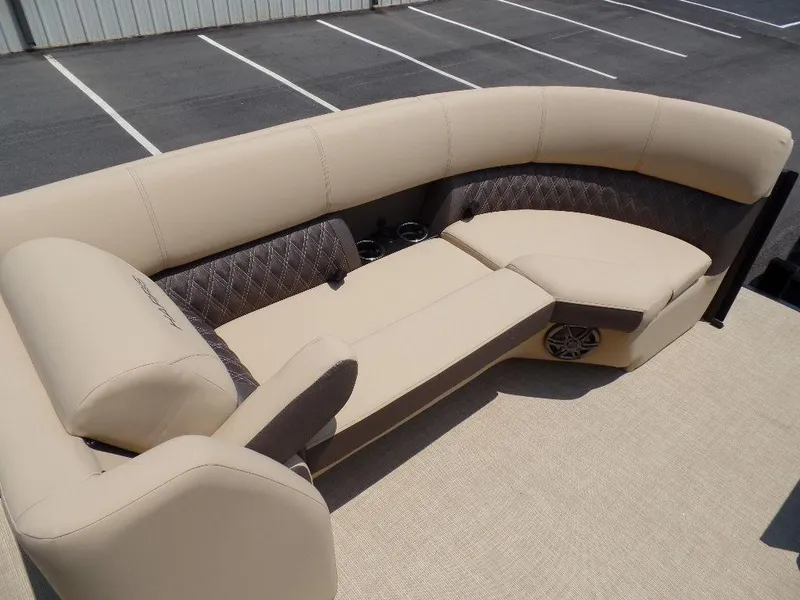 Slide: The Image of Luxurious seating on 2025 Harris SUNLINER SP 250 pontoon boat, featuring beige upholstery. - 7