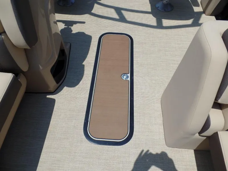 Slide: The Image of Harris SUNLINER SP 250 boat interior, 2025 model, featuring a sleek floor compartment. - 8