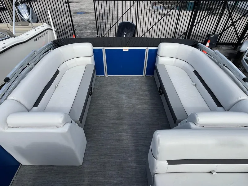 Slide: The Image of 2022 Godfrey Sweetwater 2286 C pontoon boat with spacious seating and modern design. - 7