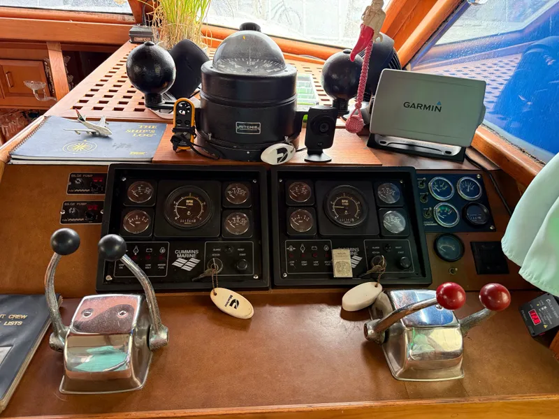 Slide: The Image of Control panel of a 1986 Jefferson Sundeck boat with navigation instruments and gauges. - 3