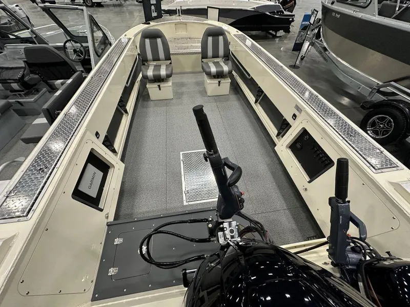 Slide: The Image of 2025 Hewescraft 200 Pioneer boat interior with seating and storage compartments. - 4