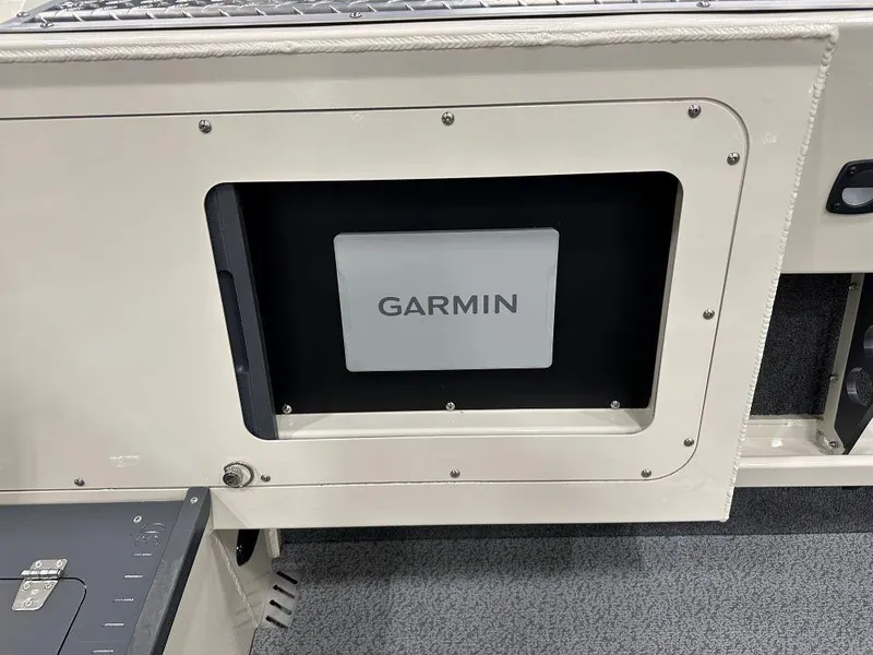 Slide: The Image of Garmin device installed on 2025 Hewescraft 200 Pioneer boat dashboard. - 5