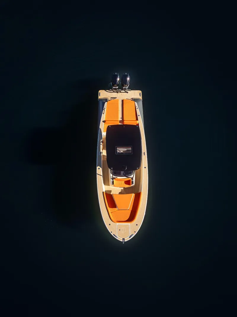 Slide: The Image of Aerial view of 2025 AlCustom LIPARI 31 boat on dark water. - 25