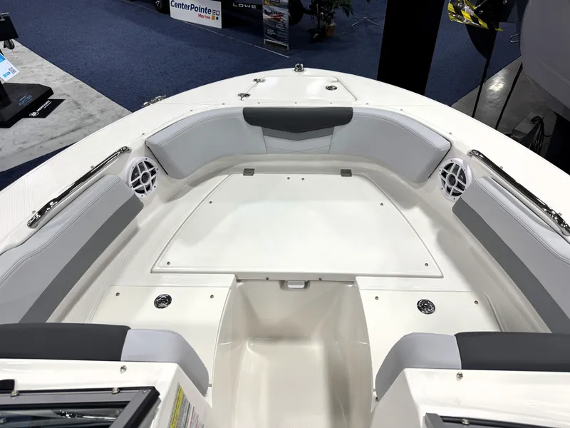 Slide: The Image of 2025 Robalo R207 Dual Console boat interior with seating and storage. - 16