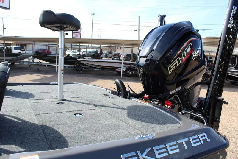 Slide: The Image of 2025 Skeeter ZXR21 boat with powerful engine and spacious deck. - 13