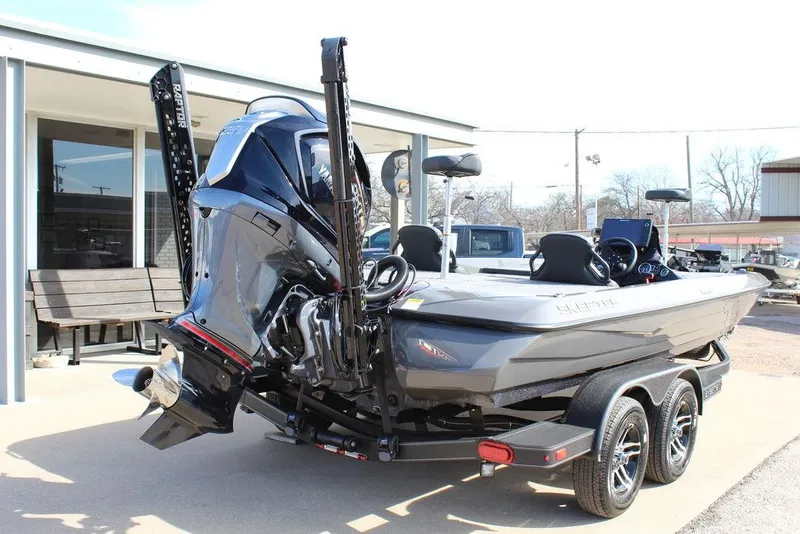 Slide: The Image of 2025 Skeeter ZXR21 boat on trailer, featuring powerful outboard motor and sleek design. - 5