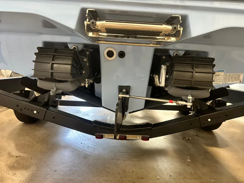 Slide: The Image of 2024 Yamaha Boats AR 220 jet propulsion system and trailer detail. - 5