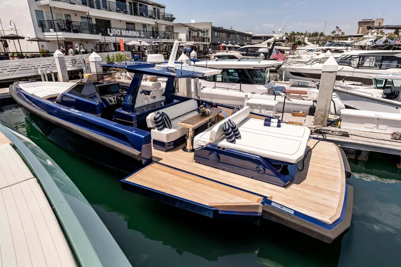 The Image of 2023 Wally Wallytender 48 yacht cruising on open water, coastal background. - 0