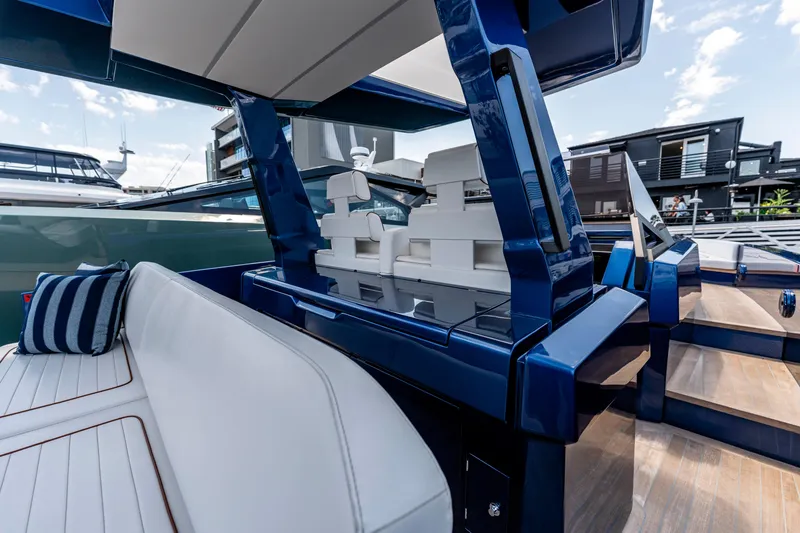 Slide: The Image of 2023 Wally Wallytender 48 yacht with sleek design and spacious deck on calm water. - 13