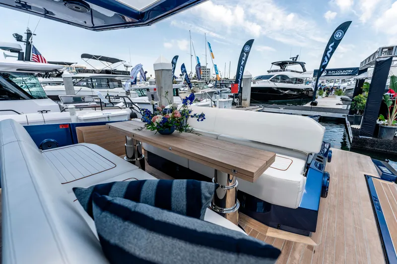 Slide: The Image of 2023 Wally Wallytender 48 yacht cruising on a scenic waterway. - 15