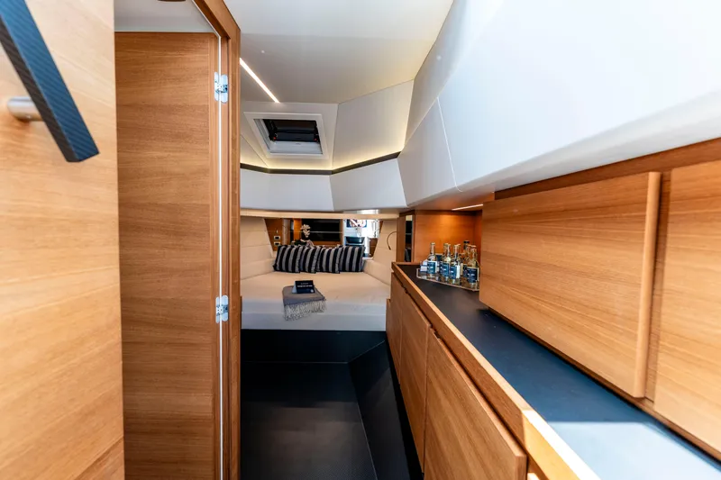 Slide: The Image of Control panel of 2023 Wally Wallytender 48 with navigation and engine displays. - 22