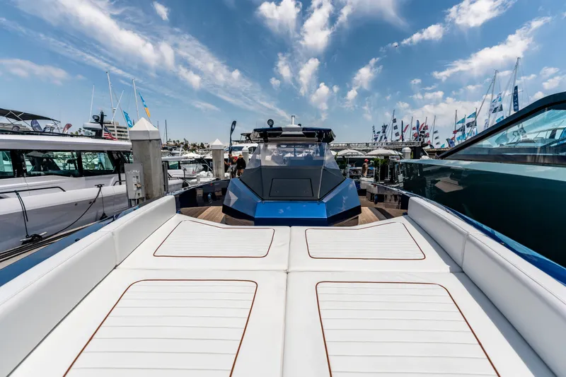 Slide: The Image of 2023 Wally Wallytender 48 yacht cruising on open sea, showcasing sleek design. - 3