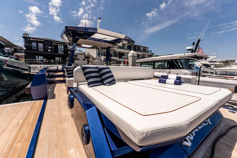 Slide: The Image of 2023 Wally Wallytender 48 yacht cruising on open sea, showcasing sleek design and performance. - 6