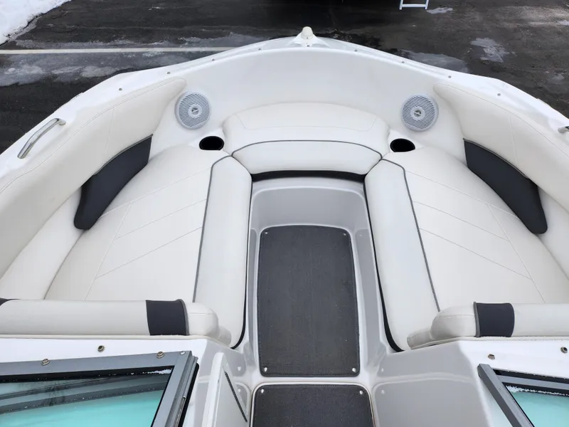 Slide: The Image of 2014 Yamaha Boats AR190 interior with white seating and speakers. - 16