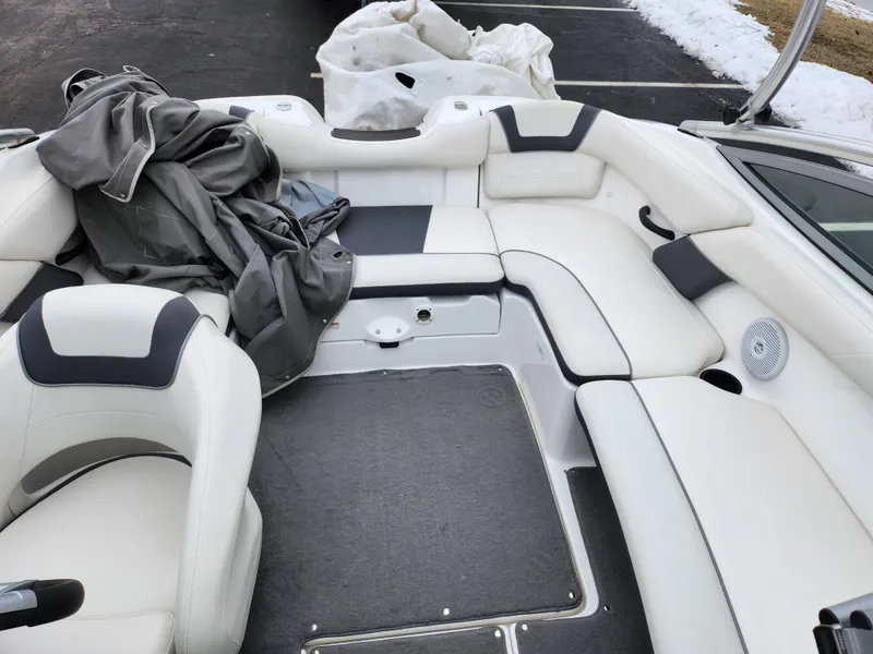 Slide: The Image of 2014 Yamaha AR190 boat interior with white seating and gray accents. - 20