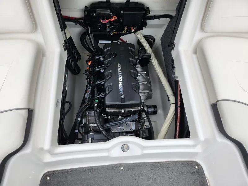 Slide: The Image of Engine compartment of a 2014 Yamaha Boats AR190, showcasing the clean and organized layout. - 21