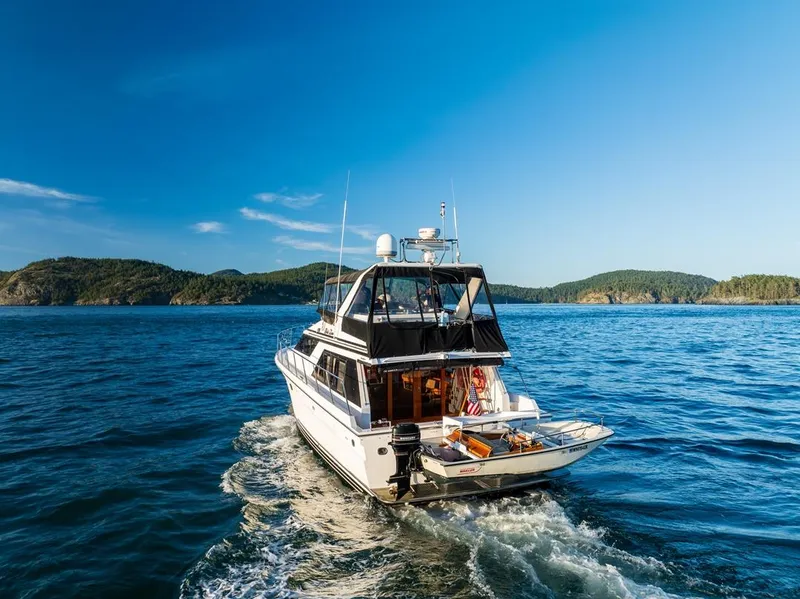 Slide: The Image of Ocean Alexander 48 Cockpit Motoryacht cruising on blue waters, 1990 model. - 14