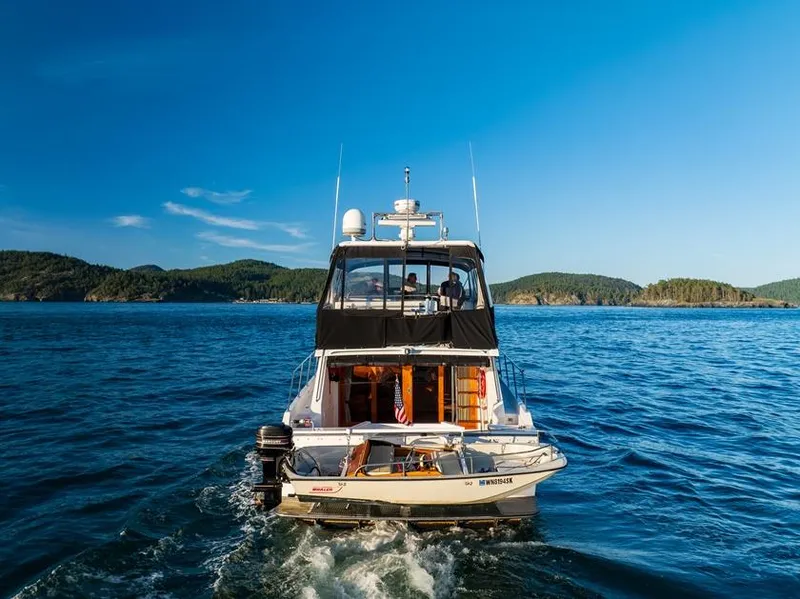 Slide: The Image of Ocean Alexander 48 Cockpit Motoryacht cruising on blue waters, 1990 model. - 15