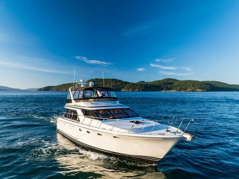 Slide: The Image of Ocean Alexander 48 Cockpit Motoryacht cruising on blue waters, 1990 model. - 9