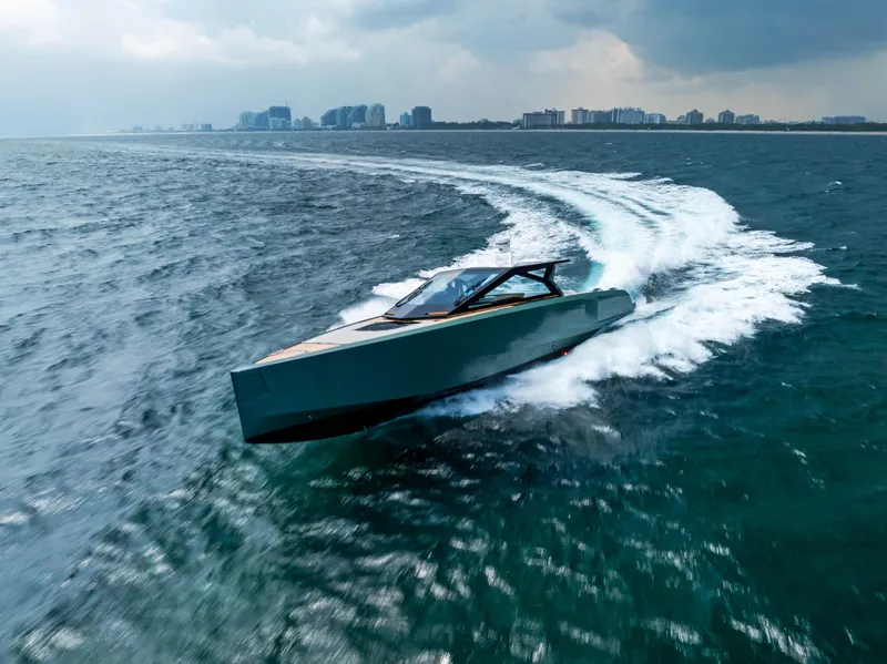 The Image of 2024 Wally WALLYPOWER 58X yacht cruising near rocky coastline. - 0