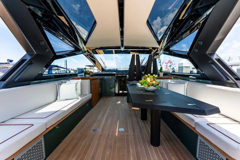 Slide: The Image of 2024 Wally WALLYPOWER 58X yacht cockpit with advanced controls and steering wheel. - 26