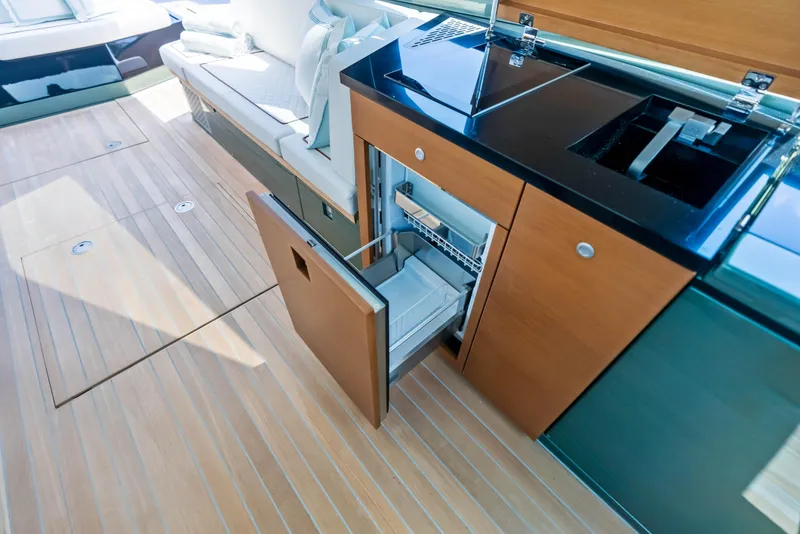 Slide: The Image of Luxurious interior of 2024 Wally WALLYPOWER 58X yacht with modern seating and wooden stairs. - 33