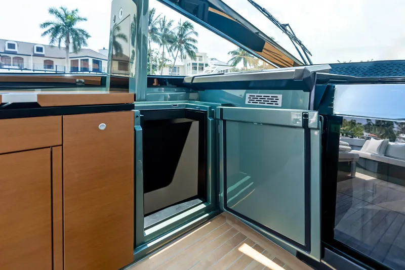 Slide: The Image of Modern kitchen interior of 2024 Wally WALLYPOWER 58X yacht with sleek cabinetry and microwave. - 34