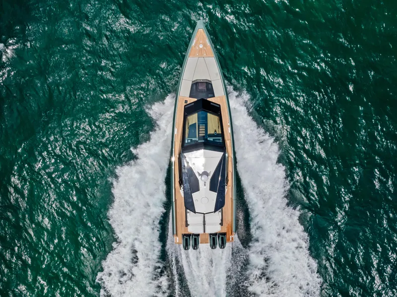 Slide: The Image of 2024 Wally WALLYPOWER 58X yacht on calm sea, sleek modern design. - 4