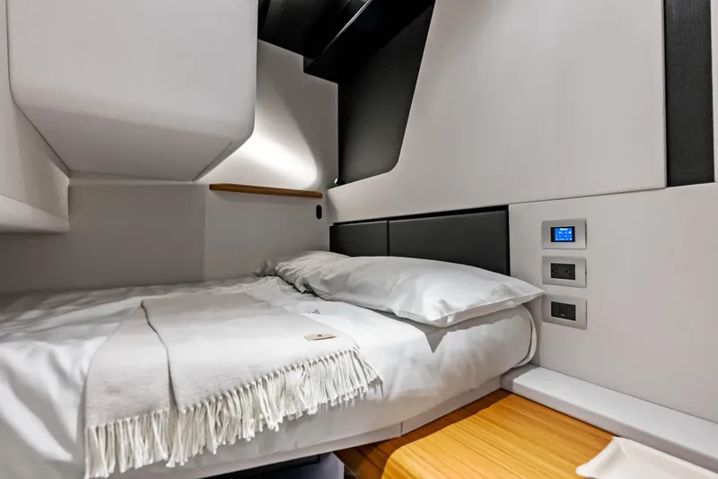 Slide: The Image of 2024 Wally WALLYPOWER 58X yacht cruising on open sea, showcasing sleek design and powerful engines. - 46