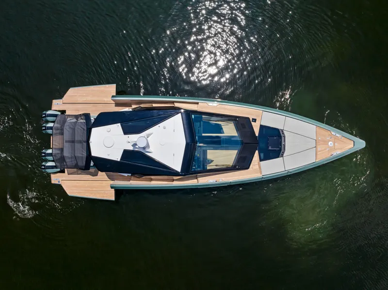 Slide: The Image of 2024 Wally WALLYPOWER 58X luxury yacht, aerial view, sleek design on water. - 54