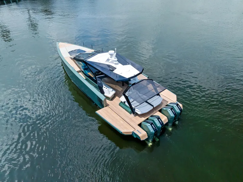 Slide: The Image of 2024 Wally WALLYPOWER 58X luxury yacht on calm water, showcasing sleek design and powerful engines. - 55