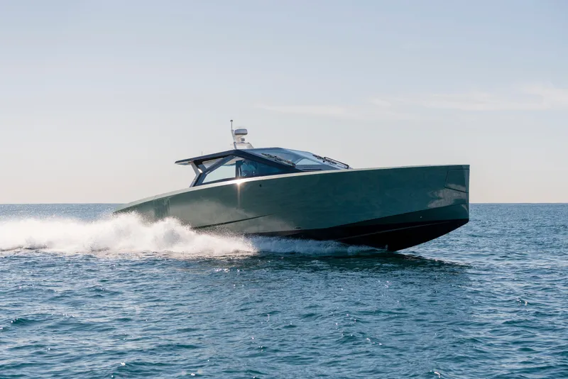 Slide: The Image of 2024 Wally WALLYPOWER 58X yacht cruising on open water. - 59