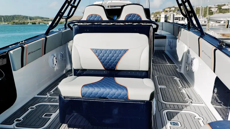 Slide: The Image of 2014 Midnight Express 37' Open boat interior with stylish seating and modern design. - 7