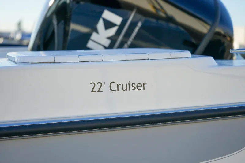 Slide: The Image of 2025 C-Dory 22' Cruiser boat with visible Suzuki engine. - 15