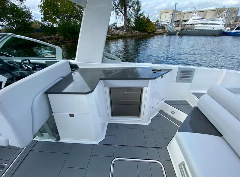 Slide: The Image of 2024 Aviara AV32 OB boat interior with sleek seating and modern amenities. - 14