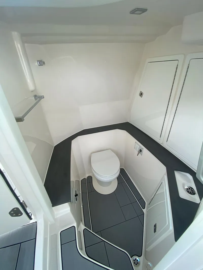 Slide: The Image of 2024 Aviara AV32 OB boat interior bathroom with modern design and fixtures. - 25