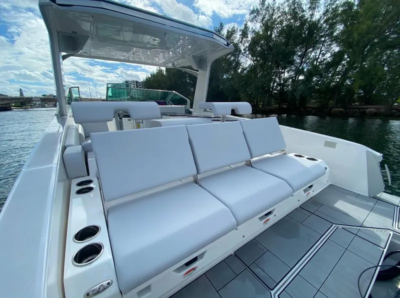 Slide: The Image of 2024 Aviara AV32 OB boat with spacious seating and sleek design on the water. - 3