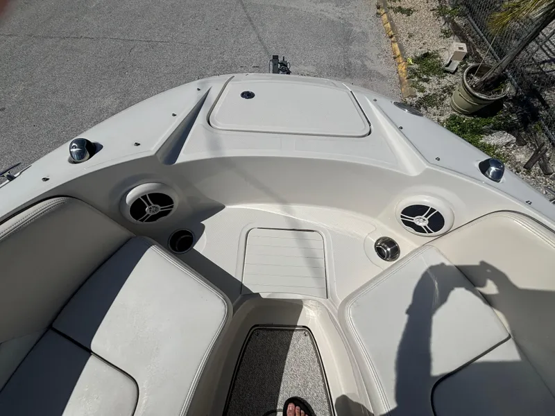 Slide: The Image of 2008 Sea Ray 230 Sundeck boat interior with seating and speakers. - 32