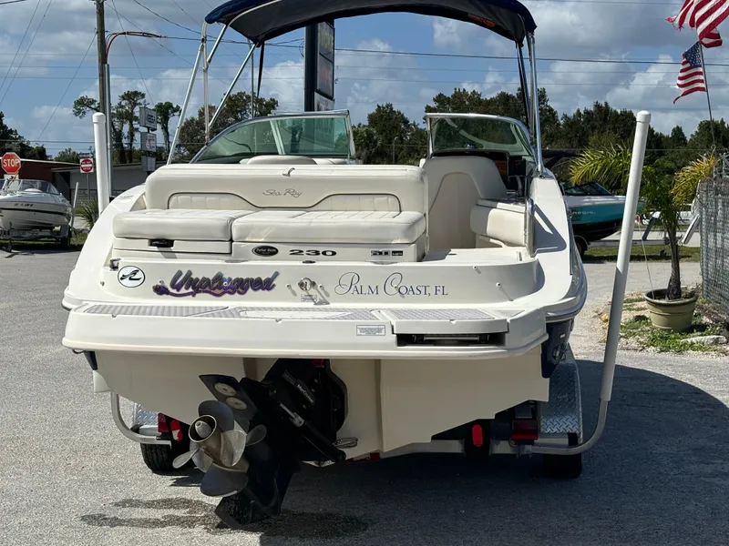 Slide: The Image of 2008 Sea Ray 230 Sundeck boat, rear view, parked in Palm Coast, FL. - 6